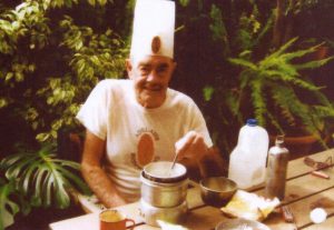 John Bartlett cooking at home