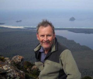 Mark Proctor on top of Precipitous Bluff, Tasmania 2010